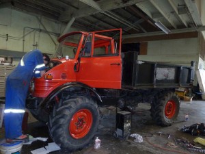 Ken doing some much needed repairs to the Mog in Oakland